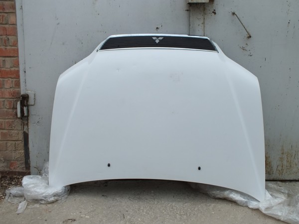 Капот Lancer Cedia