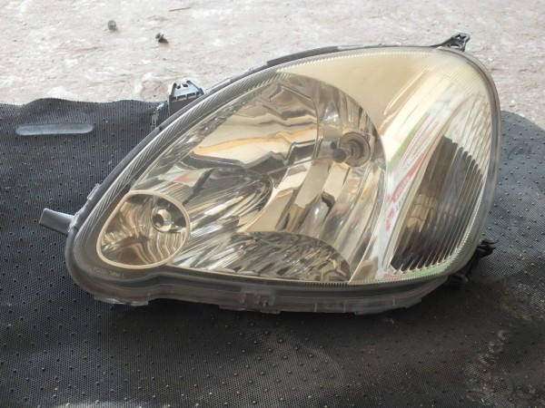  Фара Левая Toyota Vitz 52-046 SCP10 NCP10